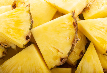 heap of slices of pineapple background