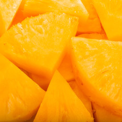 heap of slices of pineapple background