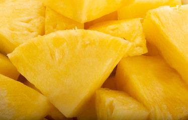 heap of slices of pineapple background