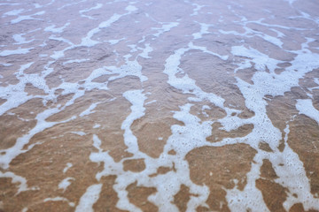 Fine beach and wawes under the summer sun as background