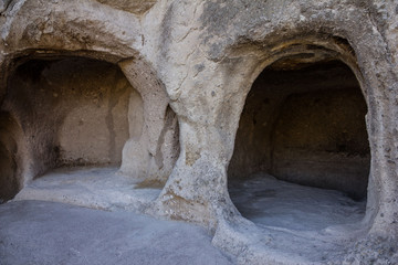 Caves in Uplistsiche - ancient rock-hewn town in eastern Georgia, Gori town. Uplistsikhe is identified as one of the oldest urban settlements in Georgia (4th century).