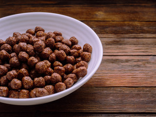 Breakfast with chocolate cereal and milk