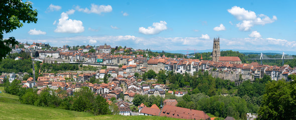 panorama view of the historic Swiss city of Fribourg with its old town and many bridges and cathedral