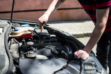 car repair open hood worker