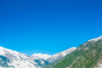Beautiful  snow covered mountains landscape Kashmir state, India .