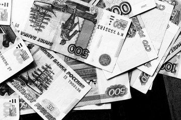 Different Russian rubles close up. Money background black and white