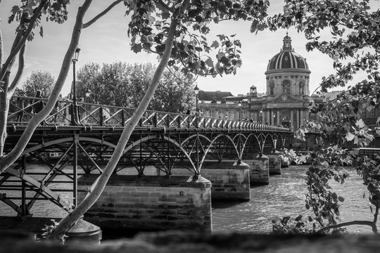 Vintage black and white photo of the Pont des Arts in Paris