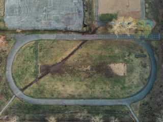 Old Football field in a beauty day. Aerial view.