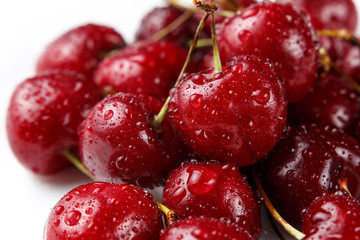 Beautiful natural background. Summer, spring concepts. Ripe and juicy fresh picked cherry berries close-up. Copy space. Template for design. Soft focus. Macro shot