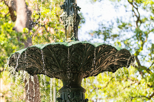 Mobile, USA Old town Bienville square park in Alabama famous southern town and closeup of water fountain spraying splashing