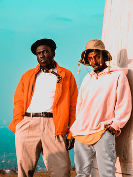 man in orange dress shirt