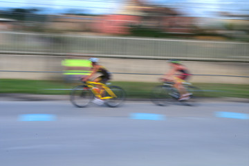 bicycle race,speed,competition,action,blur,street,road,fast,