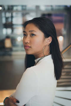 she looks over shoulder