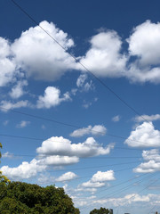 Light clouds over Sheffield in bright blue sky