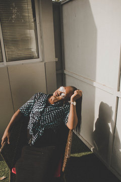 woman sitting on chair