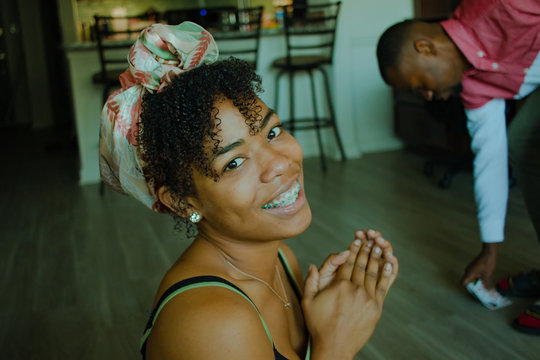 woman sitting on floor near man