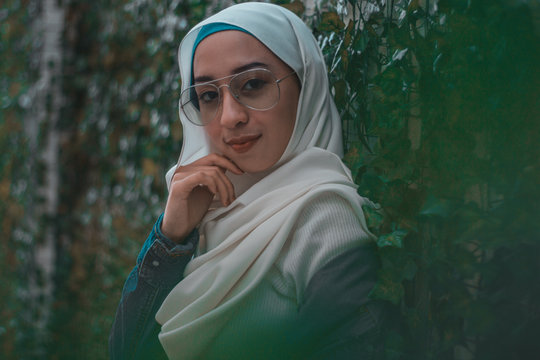 Portrait of woman in hijab standing outdoors