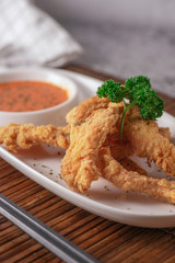fried chicken with sauce and mashed potatoes