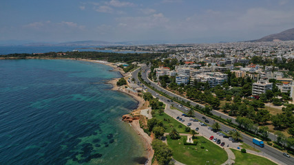 Fototapeta na wymiar Aerial drone bird's eye view of famous seascape of Athens Riviera, Voula, Athens Riviera, Attica, Greece