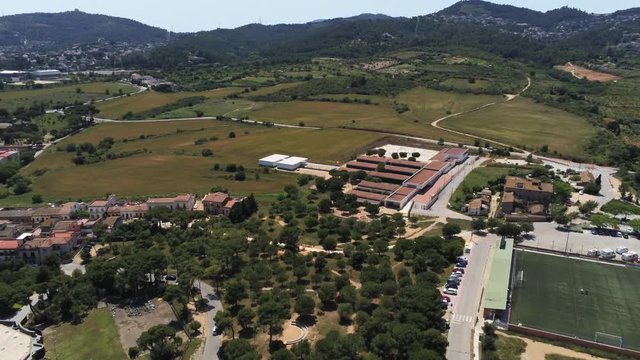 Barcelona. Aerial view in Colonia Guell and Cripta Gaudi. Santa Coloma de Cervello.Spain. 4k Drone Video