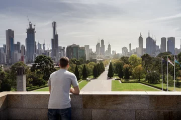 Fotobehang Boy looking to Melbourne City skyline Australia © Florian