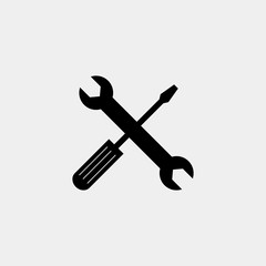Crossed wrench and screwdriver vector icon