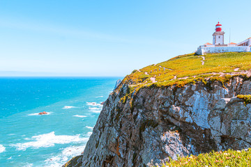 Cabo da roca lighthouse, stunning views of the ocean and rocks - obrazy, fototapety, plakaty