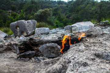 Yanartas burning stones is a geographical feature near the Olympos valley and national park in Antalya Province in southwestern Turkey