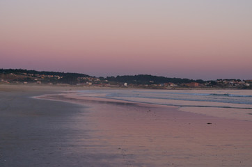 Fototapeta na wymiar Sunset view of La Lanzada Beach, O Grove, Pontevedra, Galicia, Spain