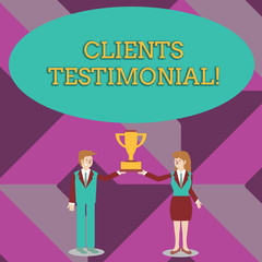 Writing note showing Clients Testimonial. Business concept for Formal Statement Testifying Candid Endorsement by Others Man and Woman Business Suit Holding Championship Trophy Cup