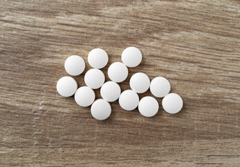DHEA pills on a table top view