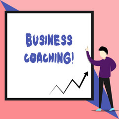 Text sign showing Business Coaching. Business photo text Helping employees become more active Consulting an expert View young man standing pointing up blank rectangle Geometric background