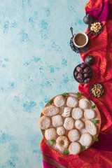 Maamoul - arabic homemade cookies filled with dates, pistachios and walnuts. Top view