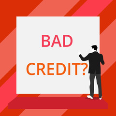 Word writing text Bad Credit Question. Business photo showcasing history when it indicates that borrower has high risk Back view young man dressed suit standing platform facing blank rectangle