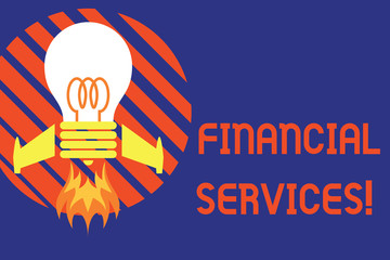 Handwriting text Financial Services. Conceptual photo Money and Investment Leasing Lending Stocks Brokerages Top view launching bulb rocket fire base. Starting new project. Fuel idea