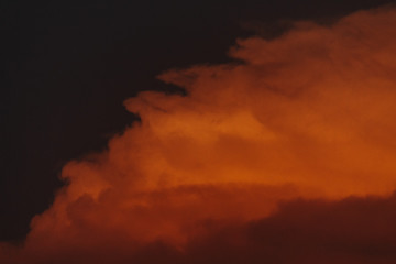 Fototapeta na wymiar View of the cloud becoming orange during sunset