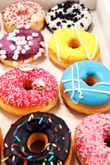 donuts in different glazes with chocolate
