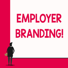 Conceptual hand writing showing Employer Branding. Concept meaning promoting company employer choice to desired target group Man stands in back view in front of huge big rectangle board