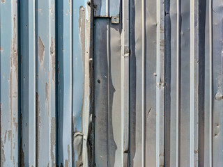 Bent and old metal siding