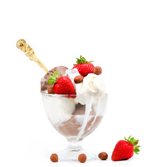 Ice cream with strawberries. Glass with ice cream with strawberries on white background