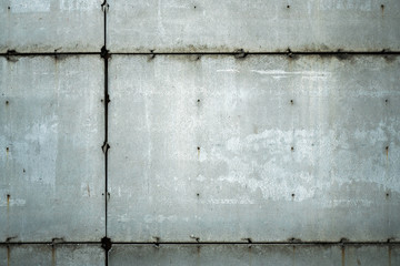 The old cement floor has many stains.