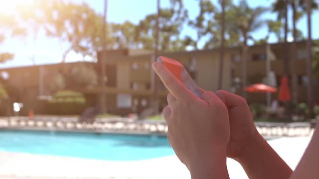 Woman using phone on the vacations in slow motion 120fps