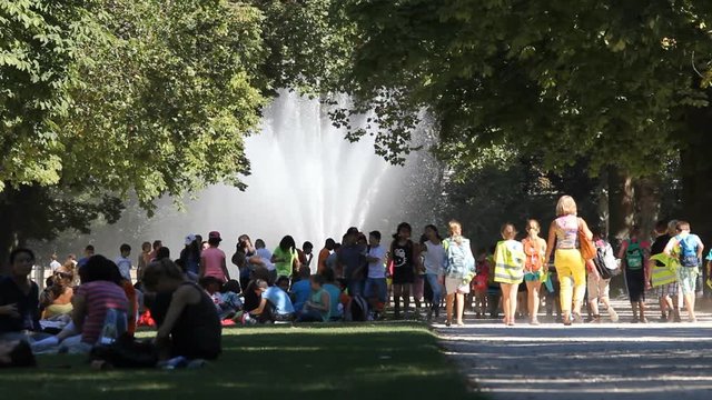 BRUSSELS, BELGIUM - SEPTEMBER 15, 2013: Many people relax in the park