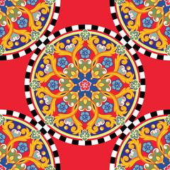 Seamless trendy bright background. Colorful ethnic round ornamental mandala on checkered pattern. Vector illustration - obrazy, fototapety, plakaty