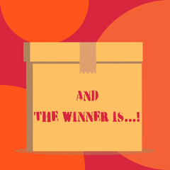 Text sign showing And The Winner Is. Business photo showcasing announcing who got first place at competition or exam Close up front view open brown cardboard sealed box lid. Blank background