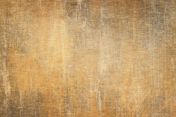 Brushed gold metal texture.