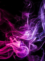 Colored smoke on black background