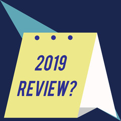 Writing note showing 2019 Review Question. Business concept for remembering past year events main actions or good shows Modern fresh and simple design of calendar using folded paper material