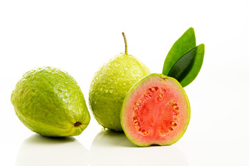 Red guava cut on white background.