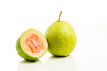 Red guava cut on white background.